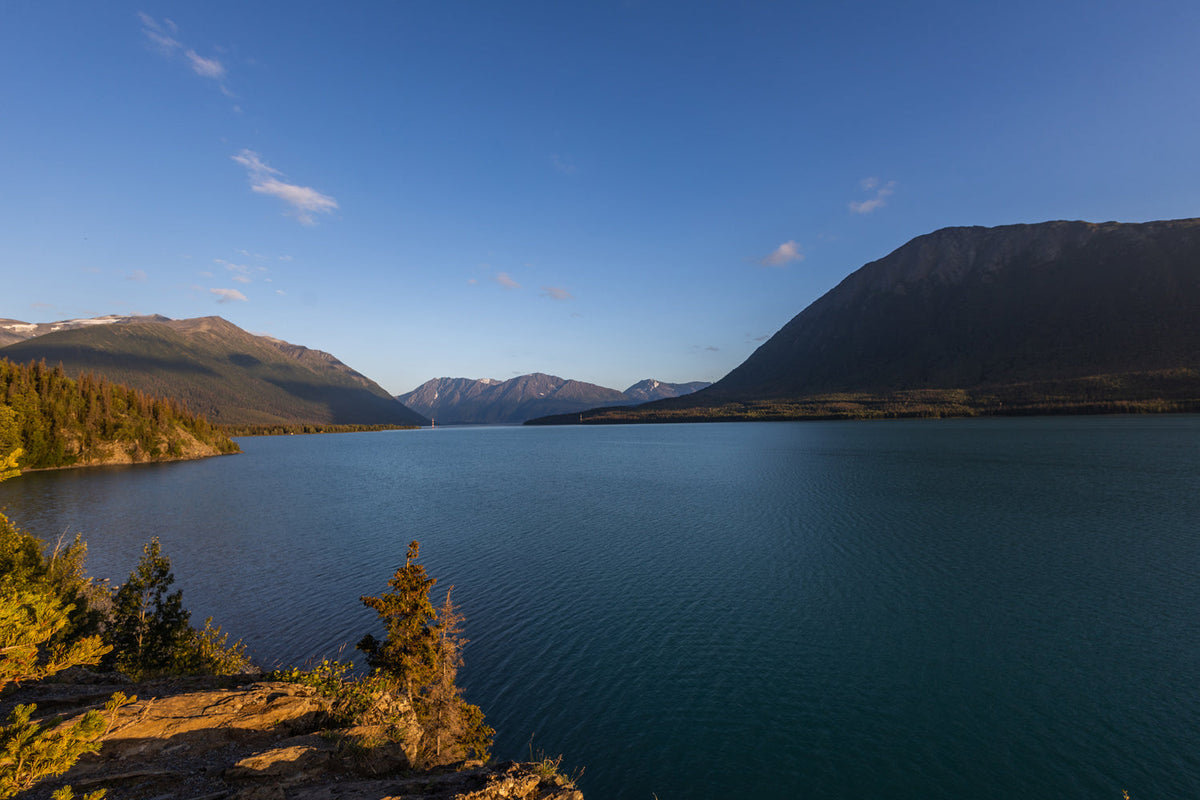 Landscape shot of a lake and mountains in the background